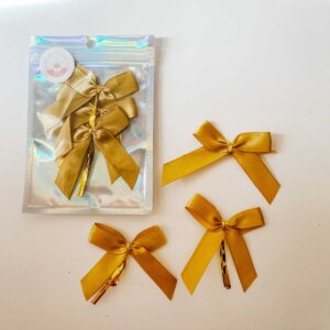 gold Cakesicle Schleife
